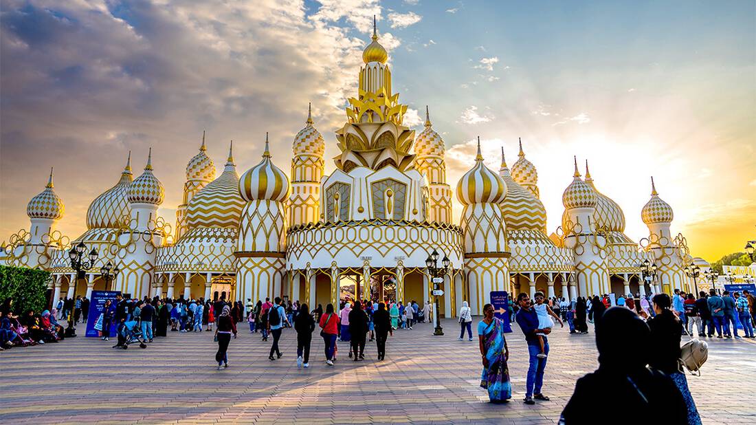 People gathered in front of Global Village