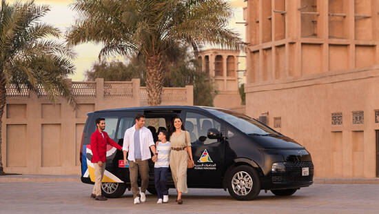 An Arabian Adventures tour guide with a family