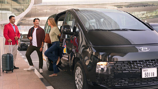 An Arabian Adventure representative picking customers from the airport