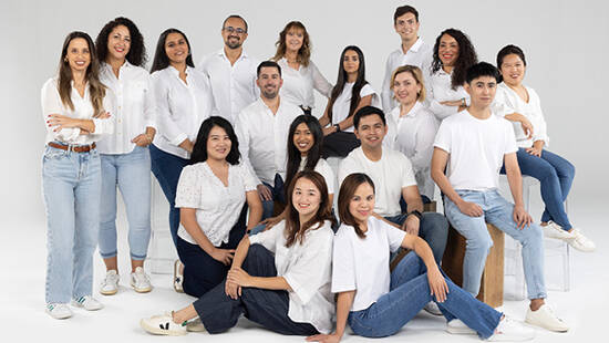 MICE team in casual white t-shirts and jeans