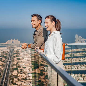 Couple looking at the Palm Dubai from the View At The Palm