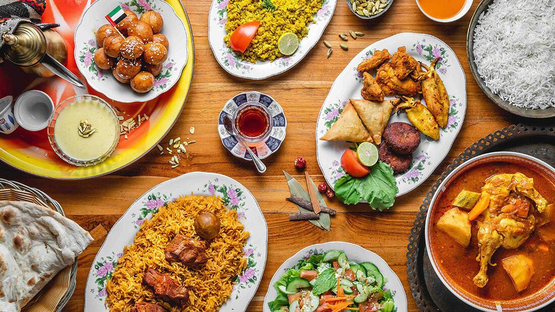 Selection of different regional dishes on a wooden table