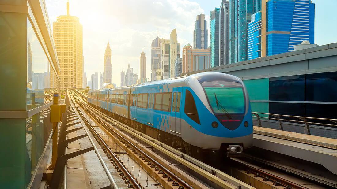 Dubai Metro with the Dubai World Trade Centre in the background