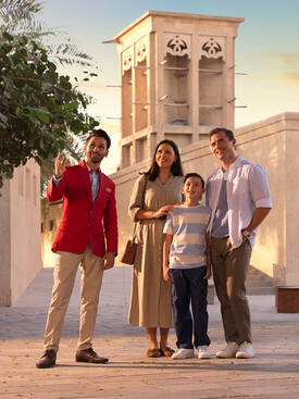An Arabian Adventures tour quide with a family