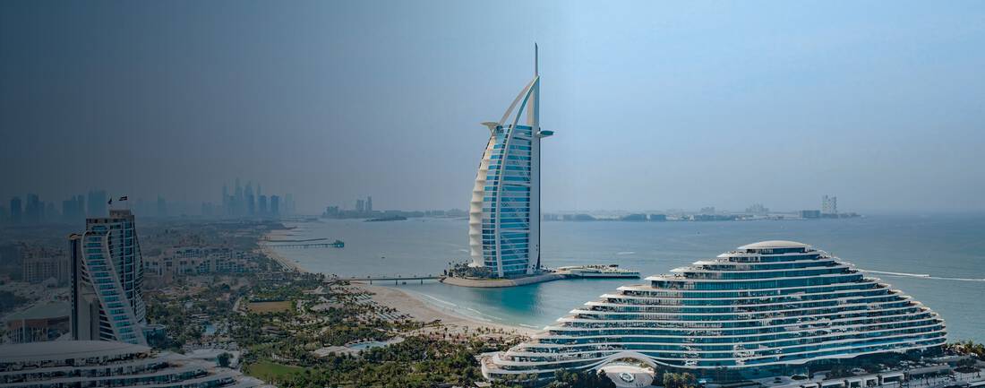 A wide view of Burj Al Arab and Jumeirah Hotel during the day