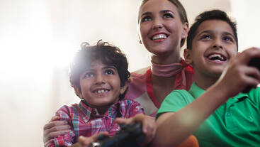 Kids playing with a marhaba representative