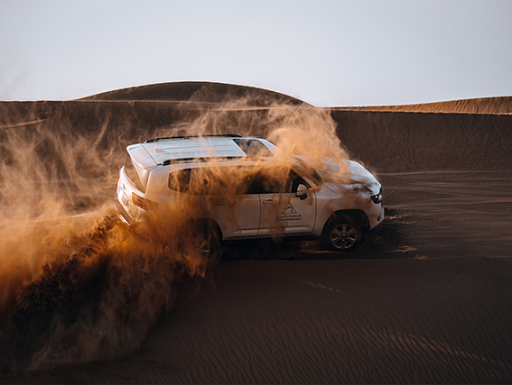 Desert safari Stroll the sands on camelback